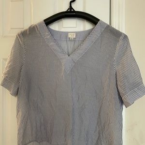 A. New. Day. Medium blue and white stripped top.